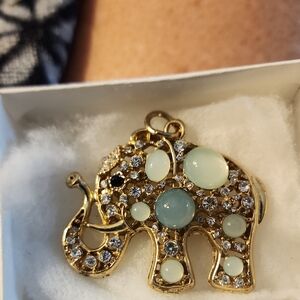 Gold-Tone Elephant Pendant with Pale Green Cabochons